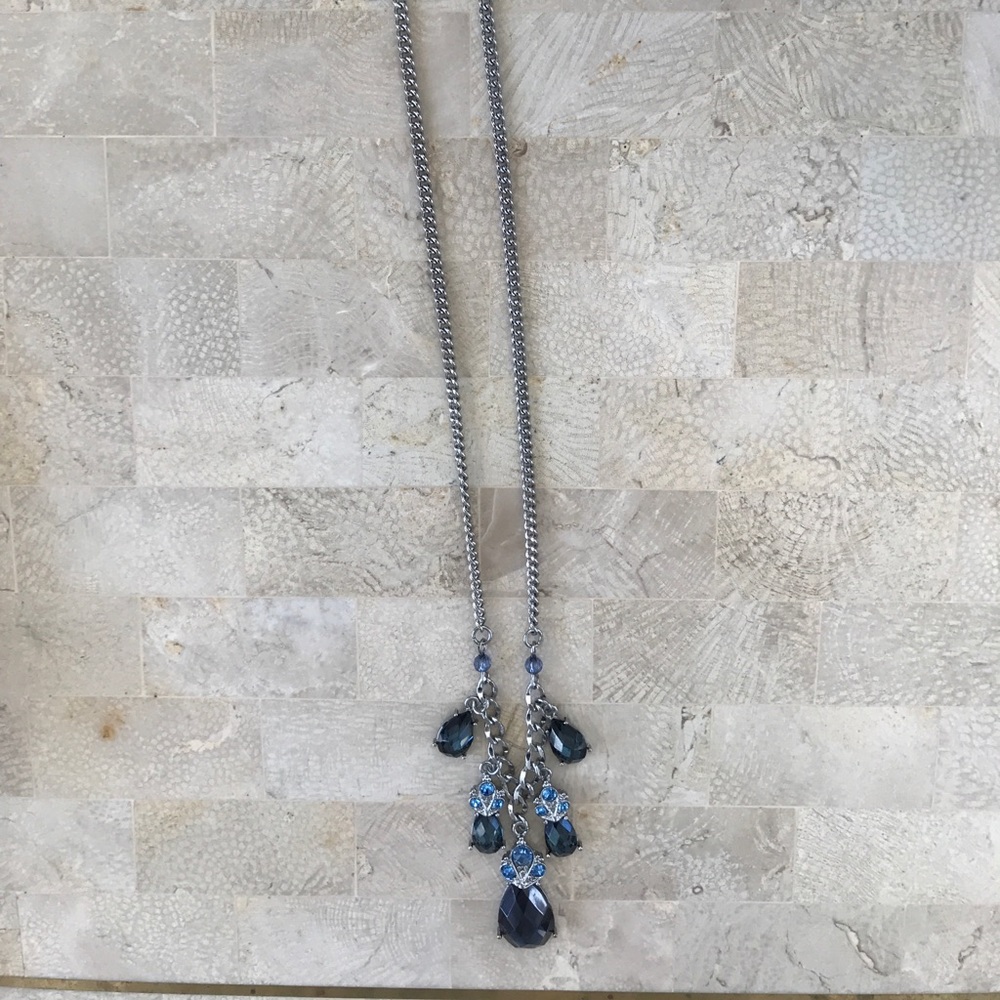 Silver necklace with 5 blue stones